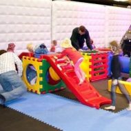Inflatable wall with kids playing