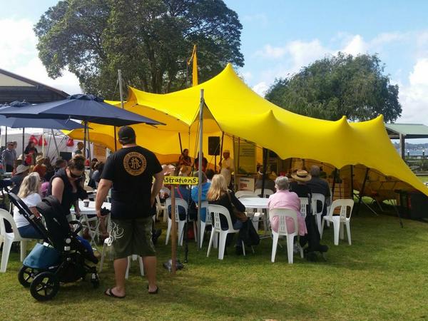 Seated cooking demo in tent