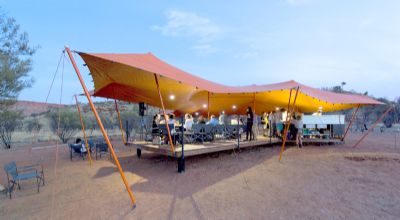 Guests relax on the Larapinta Trail - Semi-Permanent Stretch Tent - Photo by Neeson Murcutt Architects