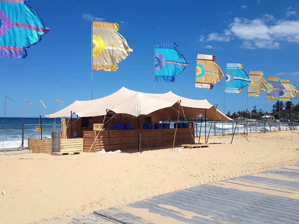 anchoring stretch tents on sand - Corona SunSets Festival