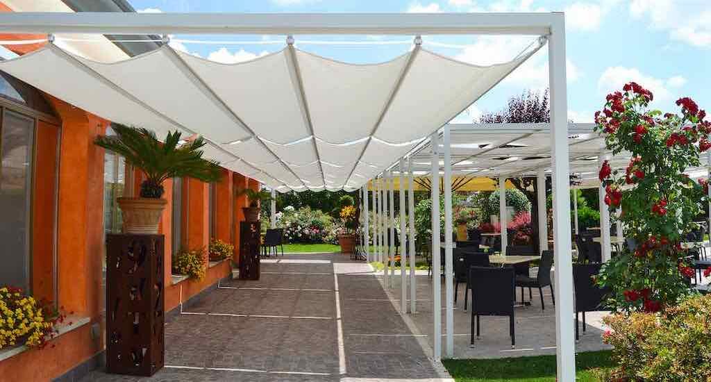 ONDA and KUBE Lite framed shade structures installed at a restaurant