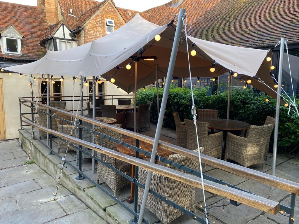 The Thatch gastro pub using stretch tent for outdoor terrace cover