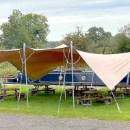 Nelsons Wharf Stretch Event Tent with narrowboat