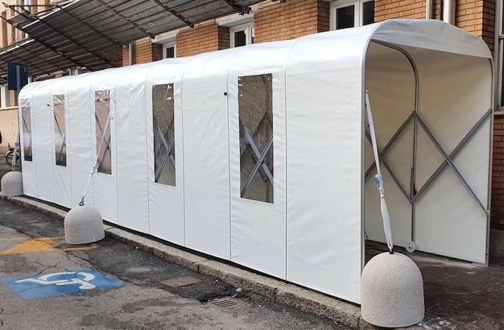 Retractable tunnels secured with Concrete Weights and Tensioning and Straps