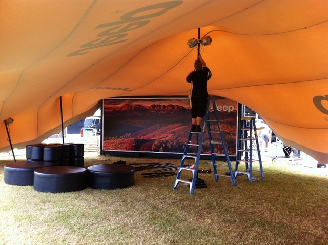 Stretch tents and shipping container pop-up