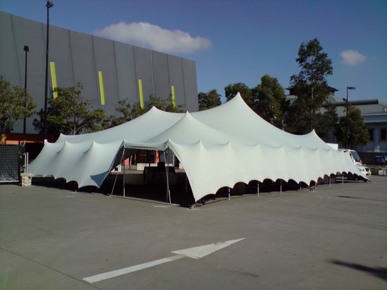 Marquee bolted into concrete - ballast guide